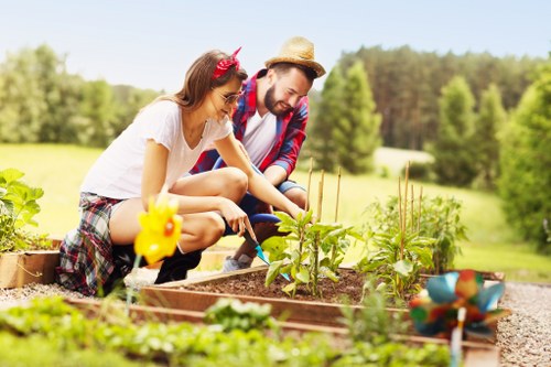 Garden maintenance work in Penge with tidy lawn and borders