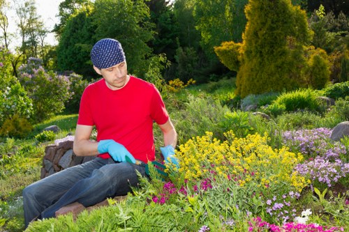 Safe use of powered gardening equipment in a managed space